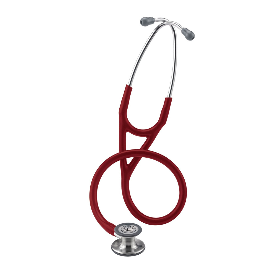 A Littmann® Cardiology IV™ Stethoscope in red and silver, with the tubing arranged in a loop, is displayed on a white background.